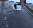 New slate roof around a roof window